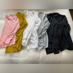 Bundle of long sleeve lululemon tees. Size 10, quantity 8